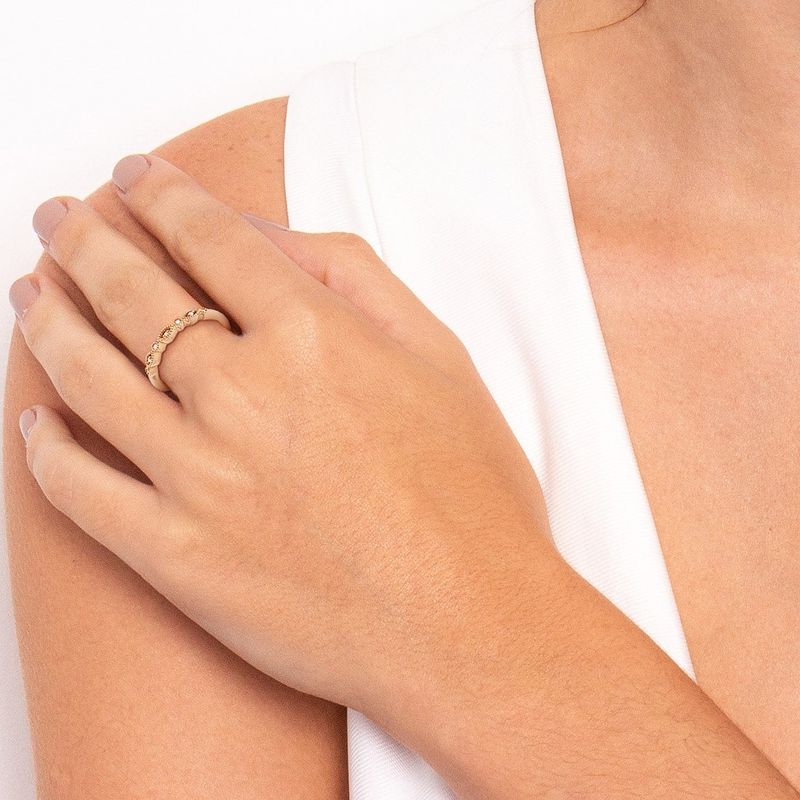 Anel-em-ouro-rose-e-7-diamantes