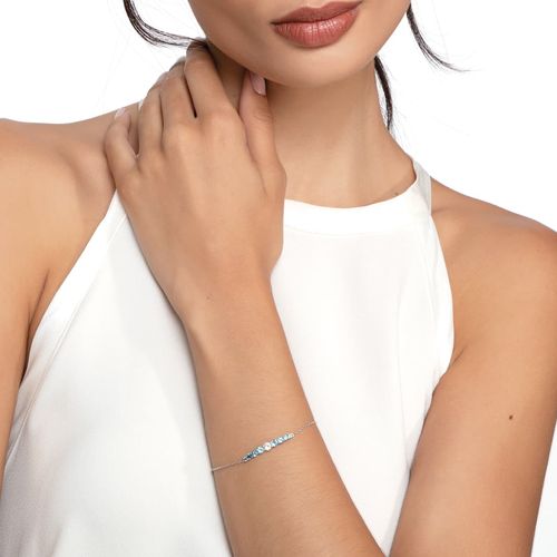 Pulseira em ouro branco com topázio branco e topázios azuis