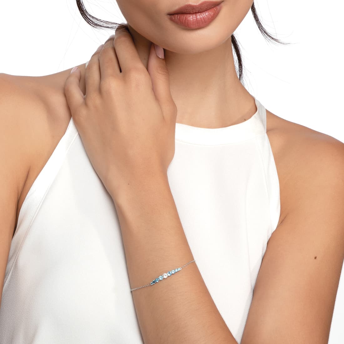 Pulseira-em-ouro-branco-com-topazio-branco-e-topazios-azuis