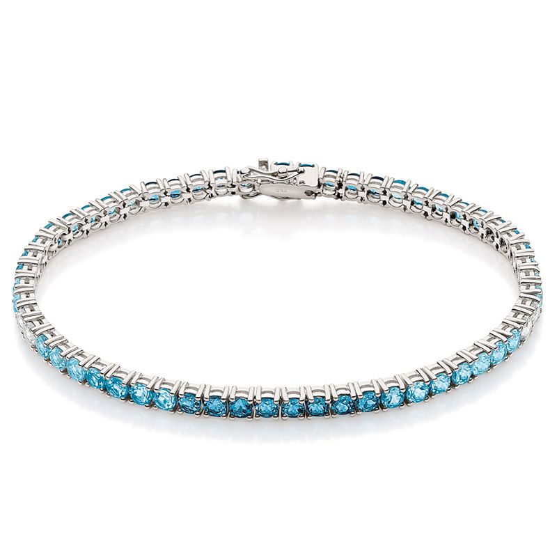 Pulseira-riviera-em-ouro-branco-com-topazios-azuis-e-topazios-brancos