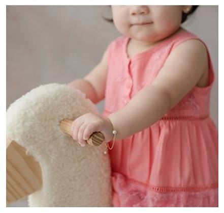 Pulseira-infantil-coracao-em-ouro-amarelo-com-perola