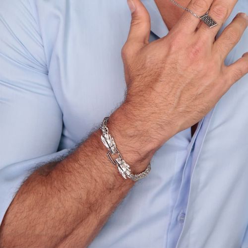 Pulseira dragão em prata com diamantes e esmeraldas