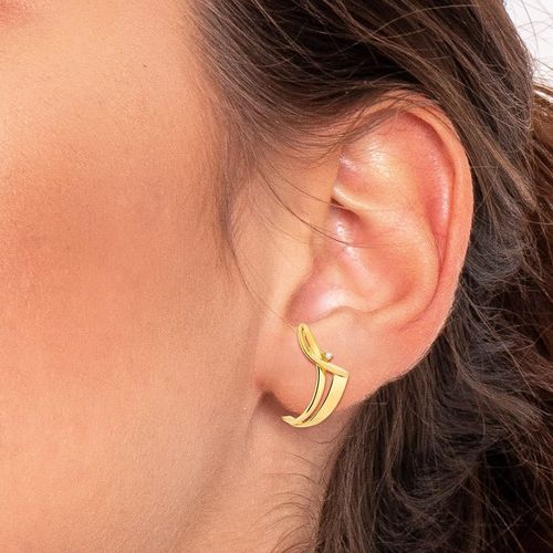 Brinco em ouro amarelo com diamantes