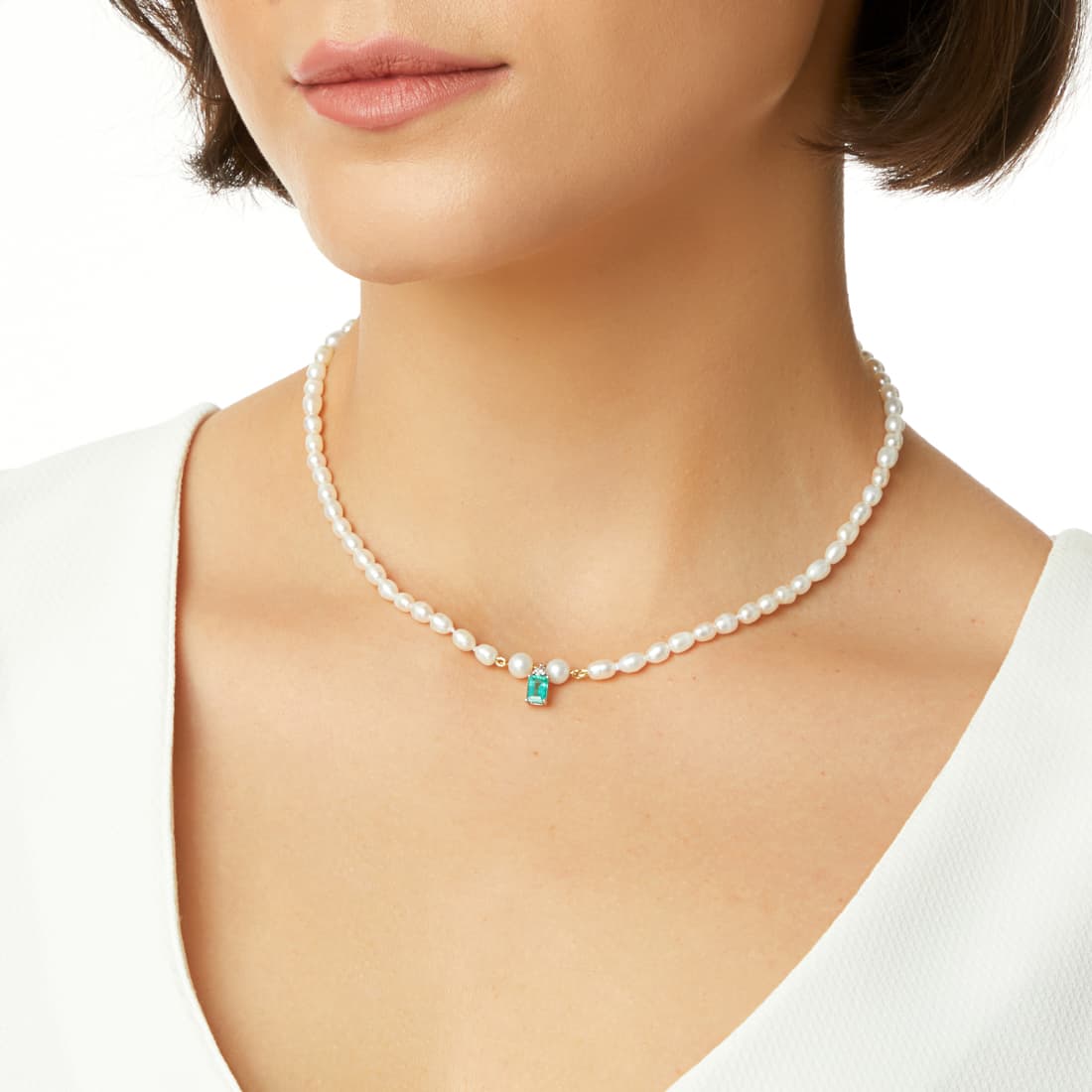 Pingente-em-ouro-branco-com-diamante-e-esmeralda