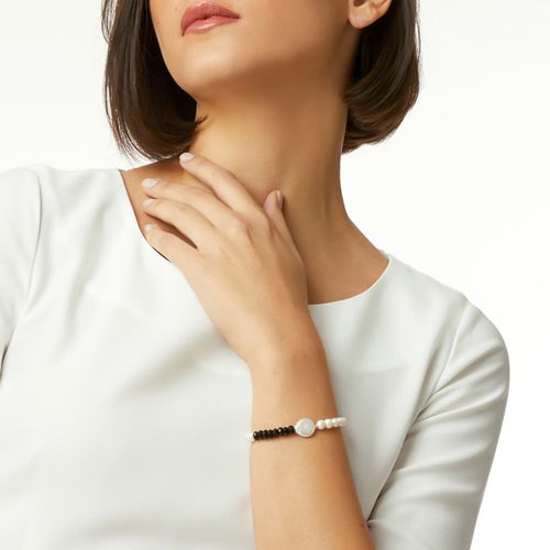 Pulseira de pérolas com pérola keshi e biwa, ônix e ouro amarelo