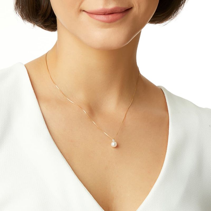 Pingente-em-ouro-amarelo-com-diamante-e-perola