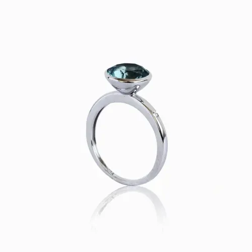 Anel em ouro branco com topázio e diamante